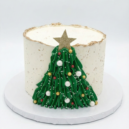 Cake with a Christmas tree and gold accents
