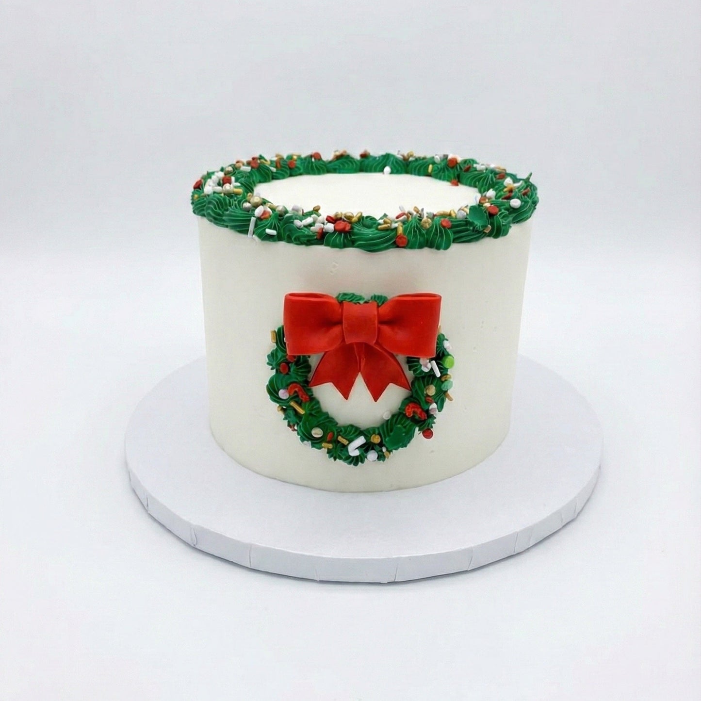 Holiday cake with a Wreath, bow, and ornaments